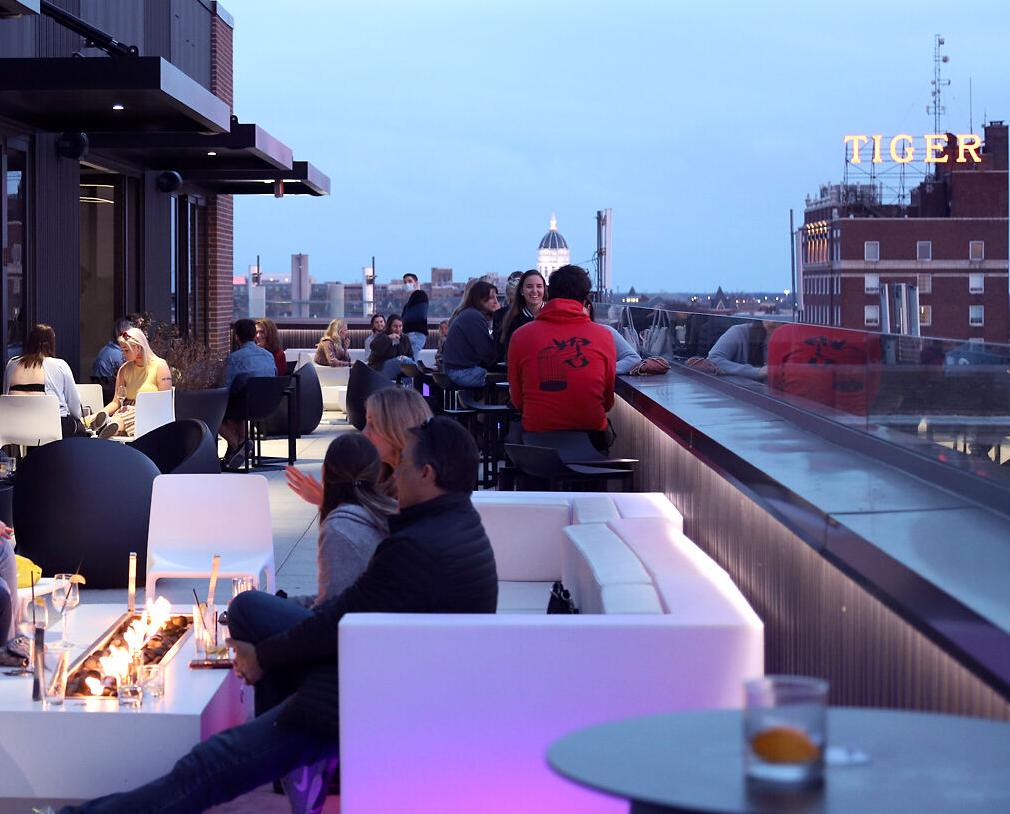 Customers sit in the open air of Columbia's Pressed